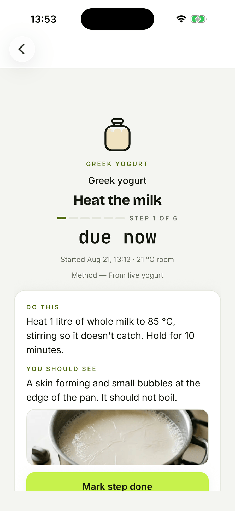 A Greek yogurt batch in barm on step 1 of 6, due now, showing the step name, progress pips, a countdown, a “do this” instruction, a “you should see” description and a checkpoint photograph of the milk at that stage.
