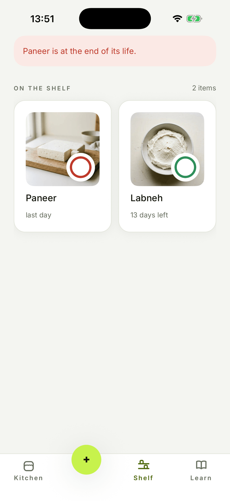 barm's shelf with two finished items photographed by the cook, a paneer on a red ring reading last day and a labneh on a green ring reading 13 days left, under a banner about the paneer reaching the end of its life.