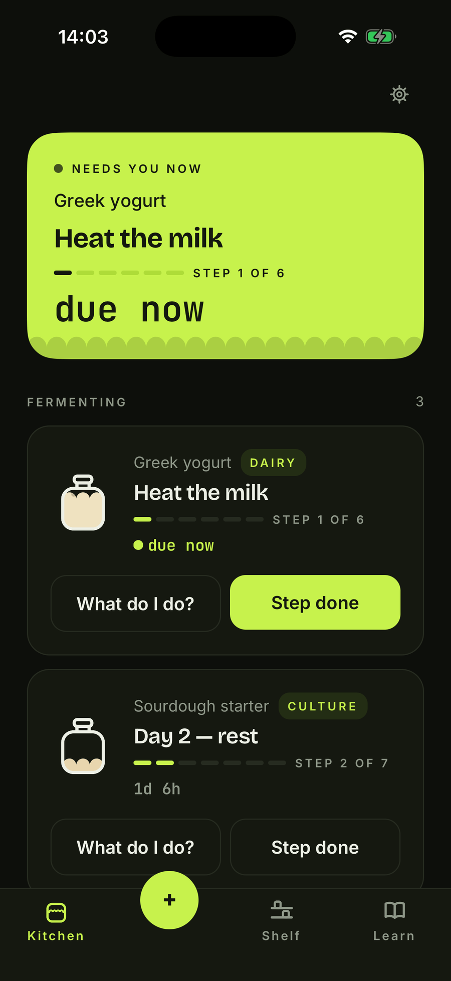 barm's Kitchen screen in dark theme, the same three batches with the lime hero card for the Greek yogurt that needs attention now.