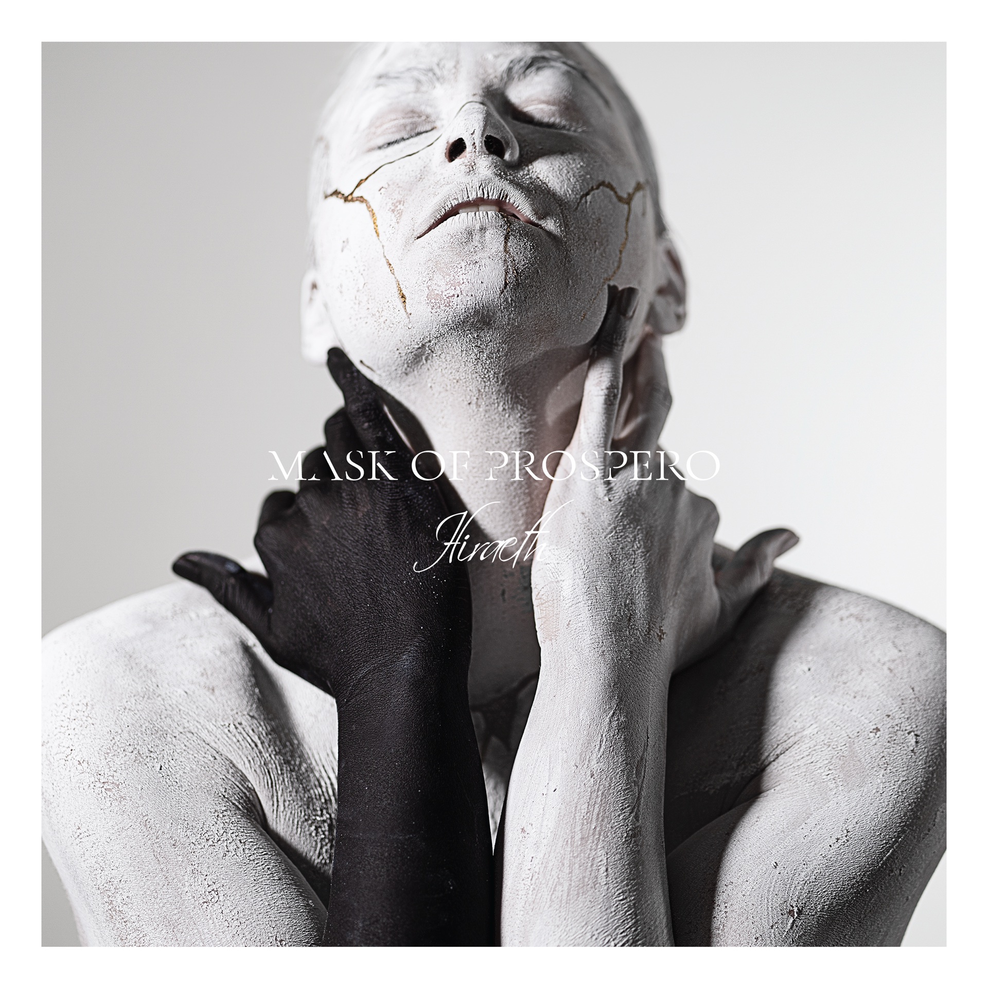 Mask of Prospero — Hiraeth album cover, sculptural figure with white concrete-textured skin, gold kintsugi cracks, and the album title set in fine serif type