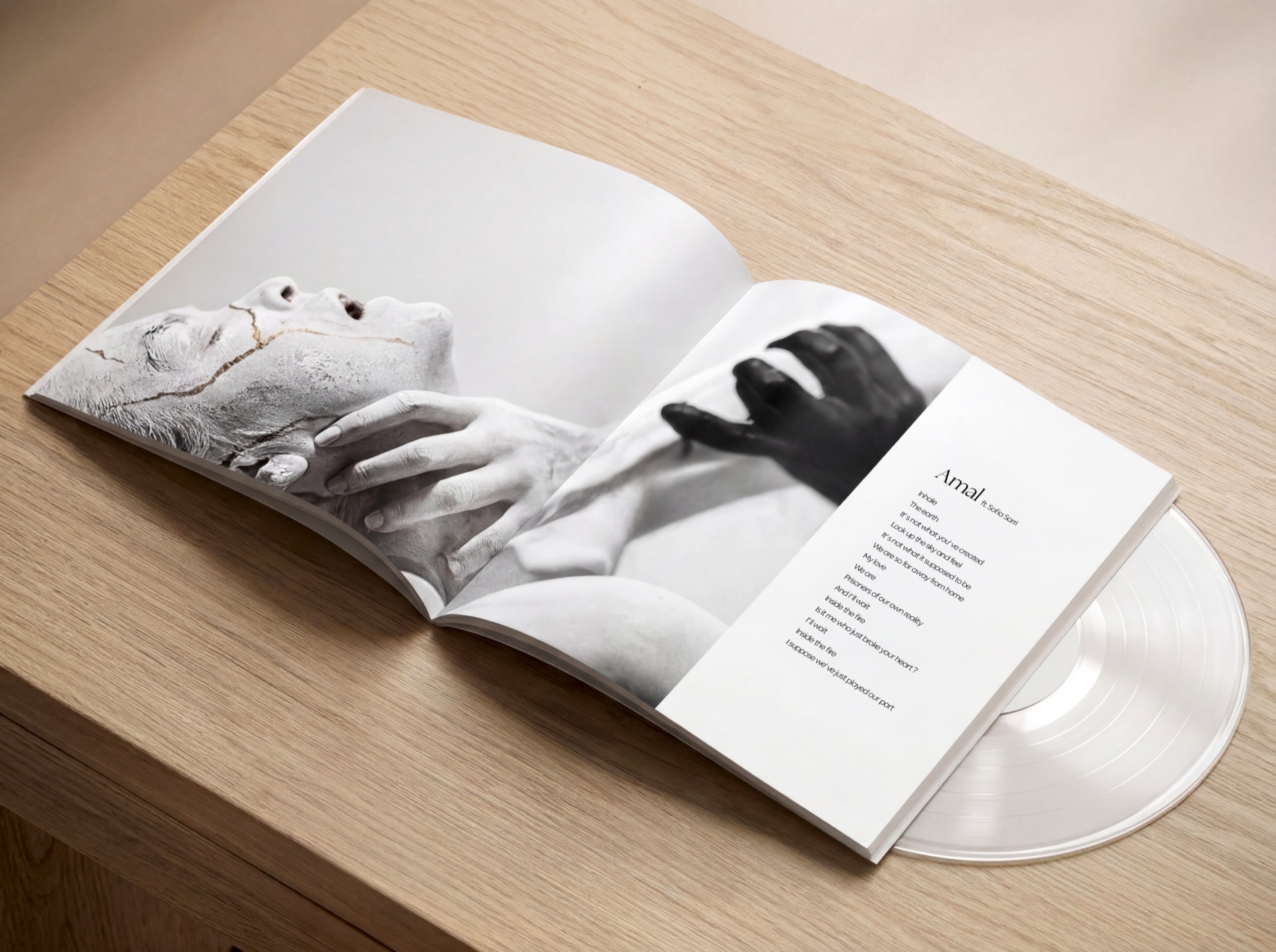Mask of Prospero album booklet open to the Amal lyric spread, sculptural photography paired with delicate typography