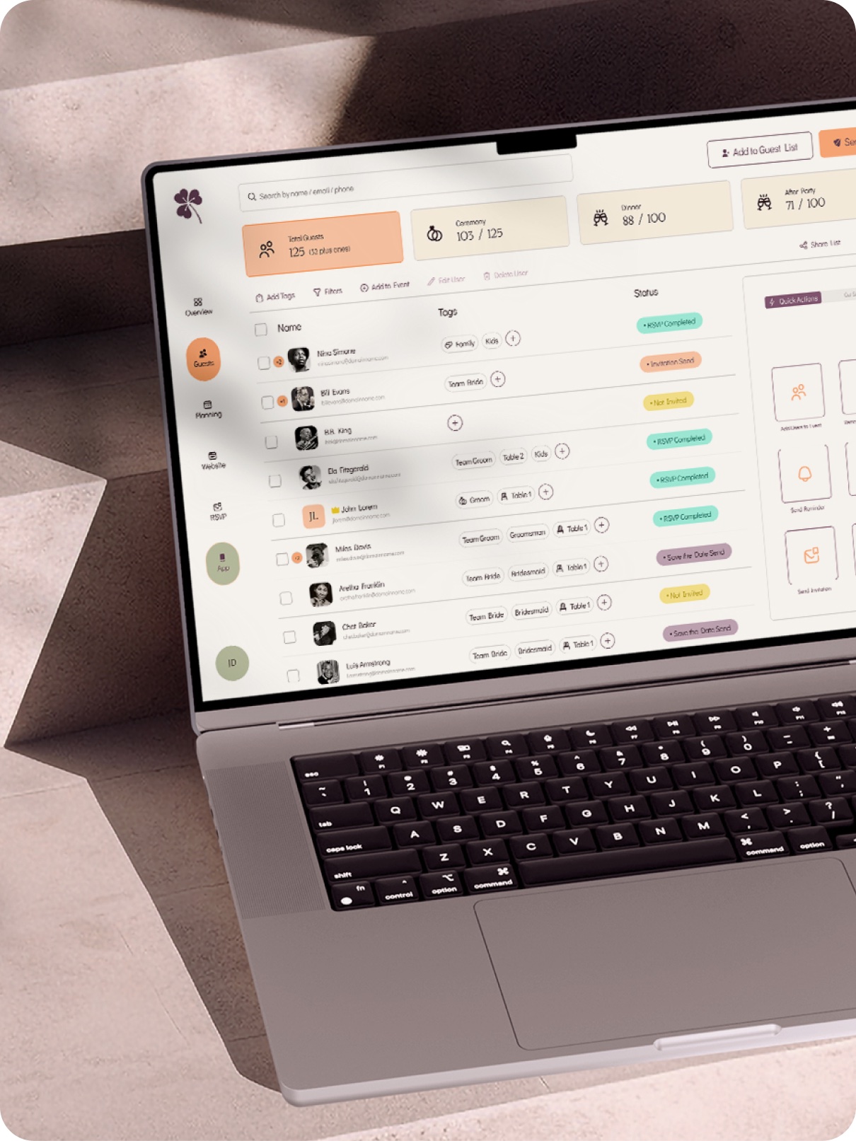 MacBook on textured concrete steps, showing the WhiteClover guest list dashboard with tags, statuses and quick actions